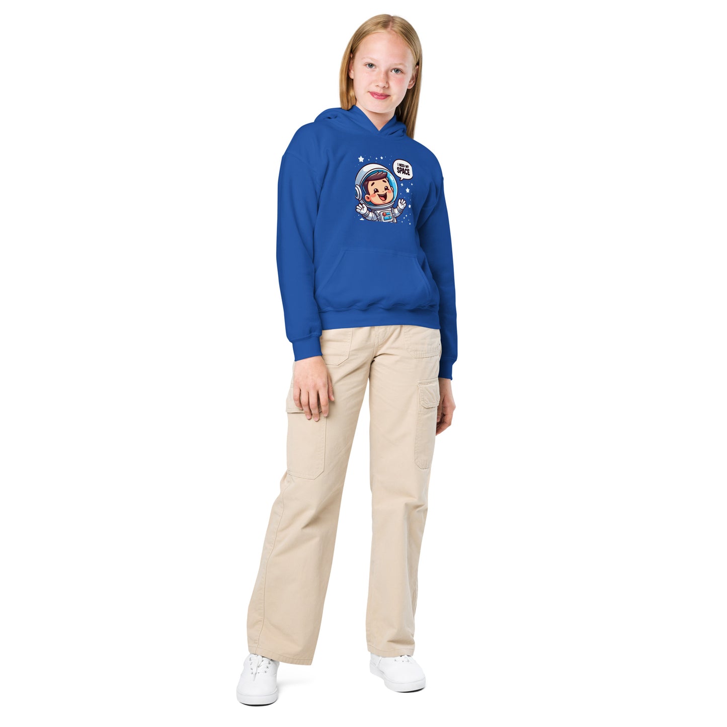 Child wearing a blue heavy blend space hoodie featuring a fun astronaut graphic