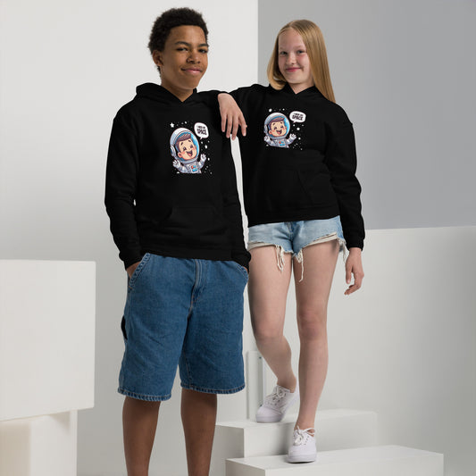 Kids wearing a heavy blend space hoodie featuring a colorful astronaut design in a modern setting