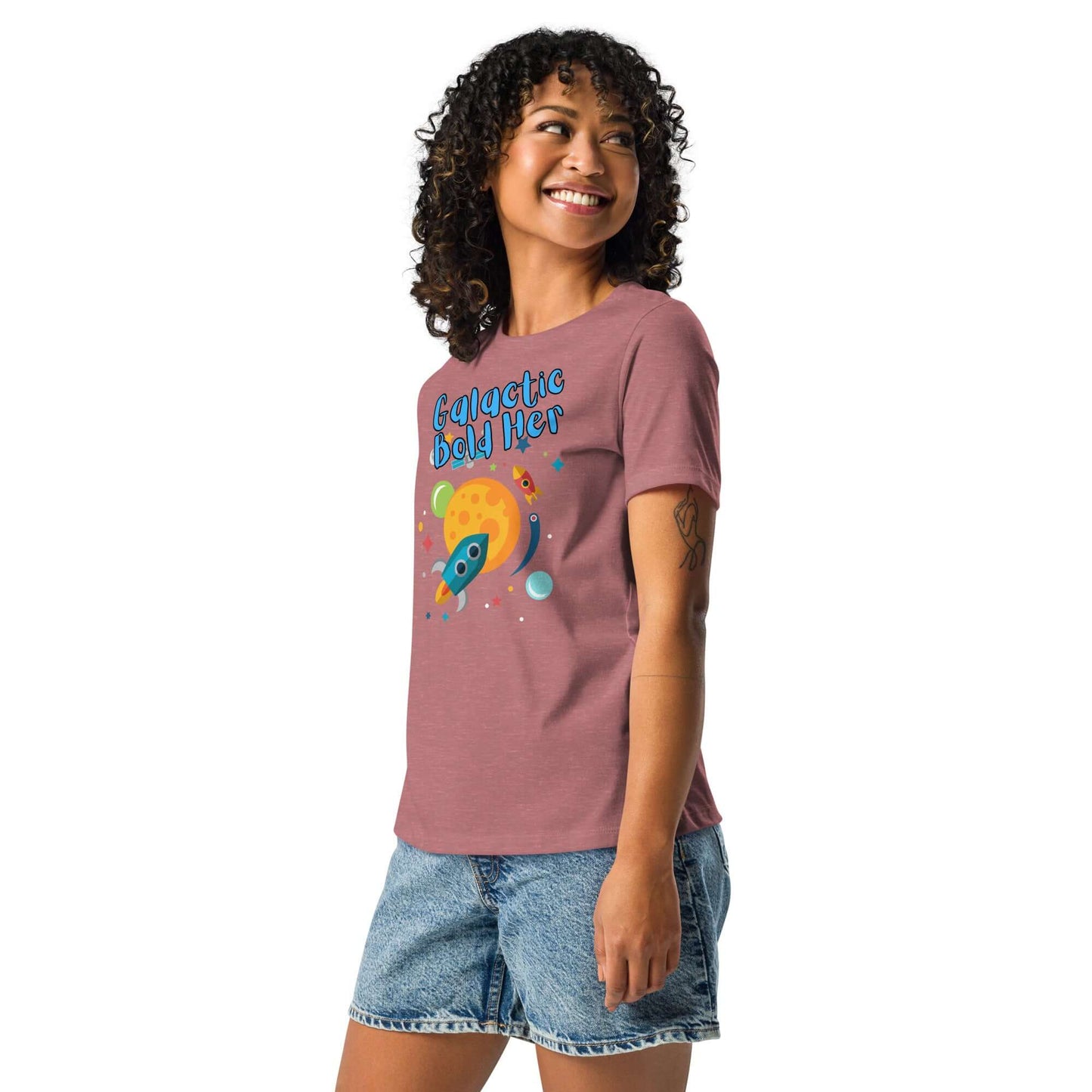 Woman wearing the Celestial Souls Women’s Relaxed T-Shirt, featuring a colorful space graphic.
