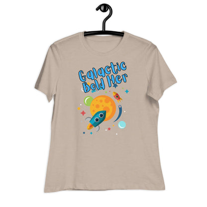 Galactic Bold Her graphic t-shirt for women featuring a colorful rocket and planet design on a beige background.