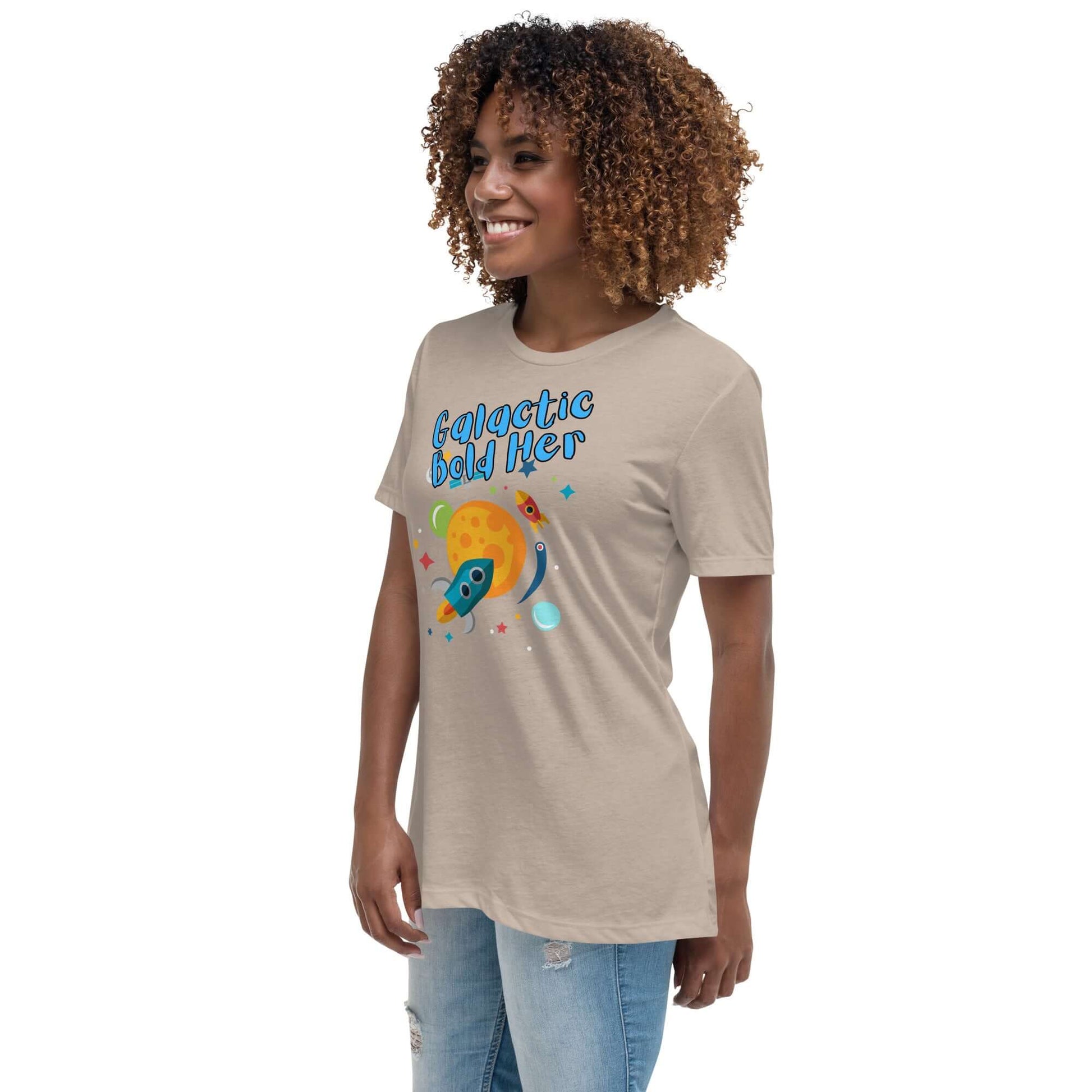 Celestial Souls Women’s Relaxed T-Shirt featuring a fun galactic design with a colorful rocket and planet.