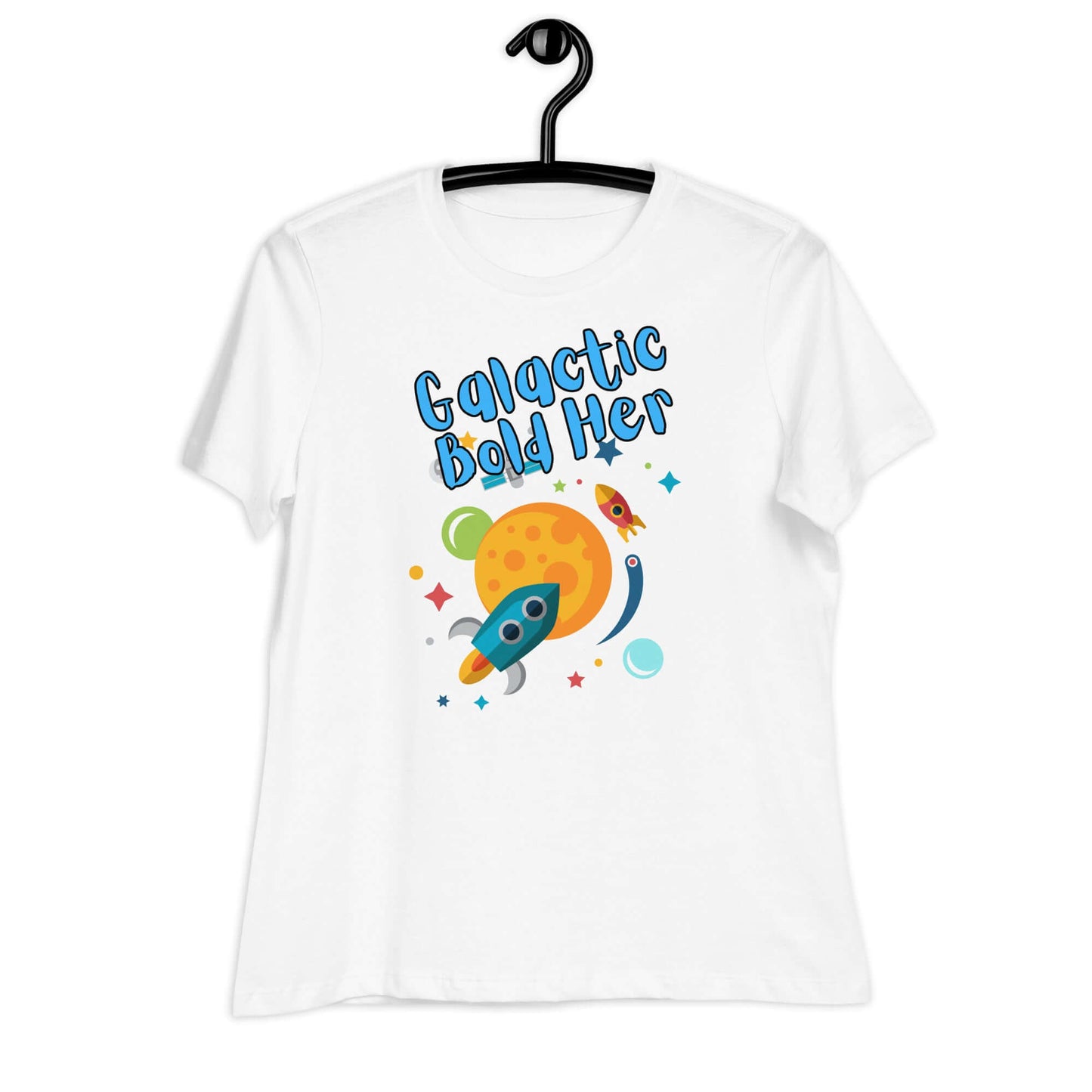 Galactic Bold Her graphic t-shirt on a hanger featuring a colorful space design with a rocket and planet.